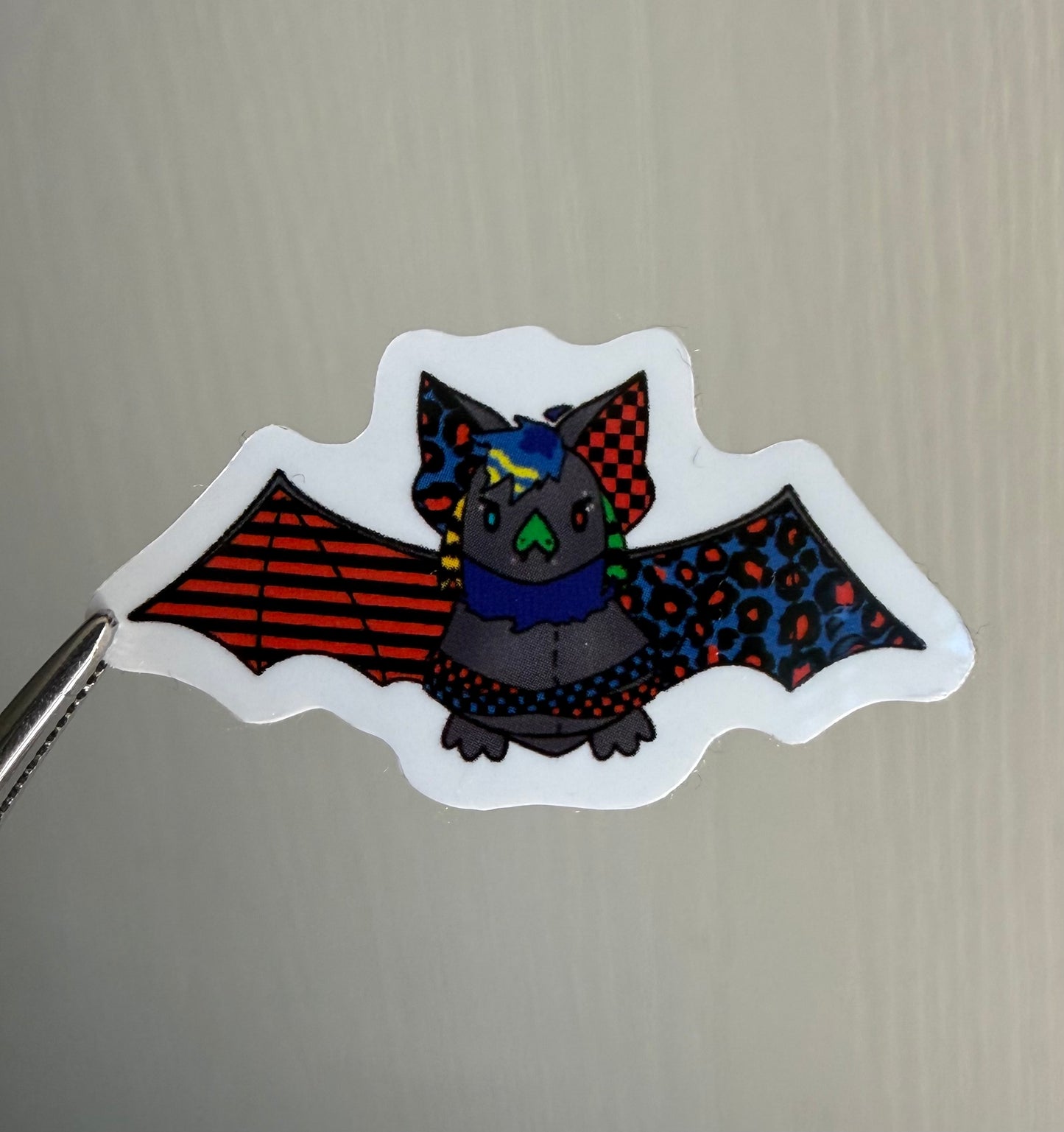Scene Bat 1.5” Mini Sticker (blue/red)